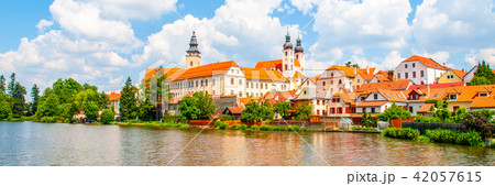 Telc Panorama. Water reflection of houses and Telc Castle, Czech Republic. UNESCO World Heritage Telc Panorama. Water reflection of houses and Telc Castle, Czech Republic. UNESCO World Heritage 42057615