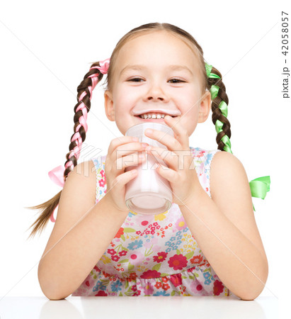 Cute little girl showing milk moustache 42058057