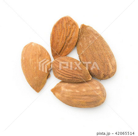 Raw almonds isolated on white Raw almonds isolated on white 42065514