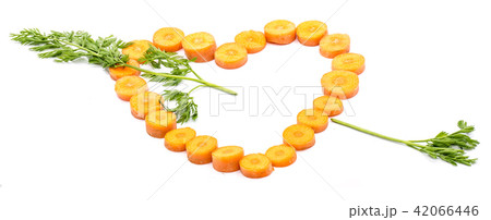 Raw carrot isolated on white Raw carrot isolated on white 42066446