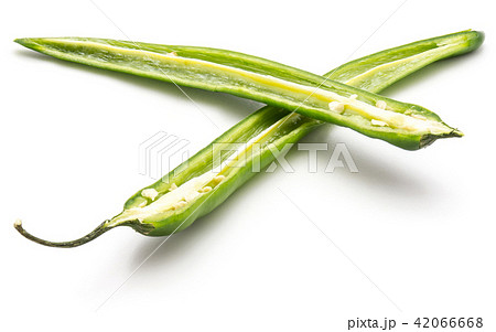 Fresh sliced chilli pepper isolated on white Fresh sliced chilli pepper isolated on white 42066668