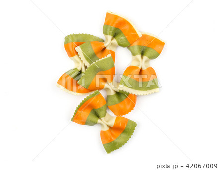 Colourful raw farfalle isolated on white Colourful raw farfalle isolated on white 42067009