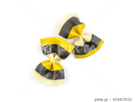Colourful raw farfalle isolated on white 42067010