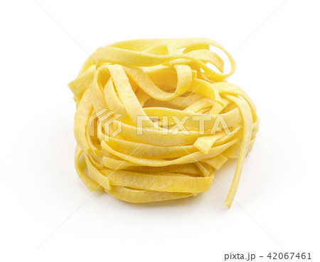 Raw fresh Fettuccine isolated on white Raw fresh Fettuccine isolated on white 42067461