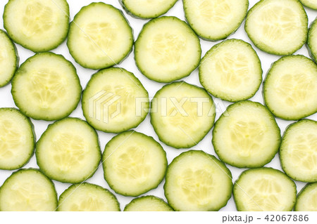 Hothouse cucumber isolated on white Hothouse cucumber isolated on white 42067886