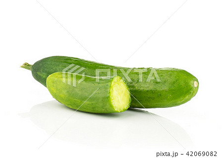 Fresh raw mini cucumber isolated on white Fresh raw mini cucumber isolated on white 42069082