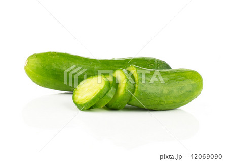 Fresh raw mini cucumber isolated on white Fresh raw mini cucumber isolated on white 42069090