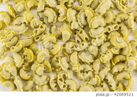 Fresh raw paste Creste di Gallo on grey wood 42069521