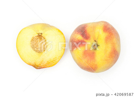 Fresh Raw yellow peach isolated on white Fresh Raw yellow peach isolated on white 42069587