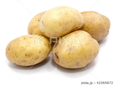 Fresh raw potatoes isolated on white Fresh raw potatoes isolated on white 42069872