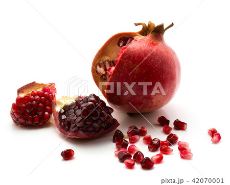 Fresh pomegranate isolated on white Fresh pomegranate isolated on white 42070001
