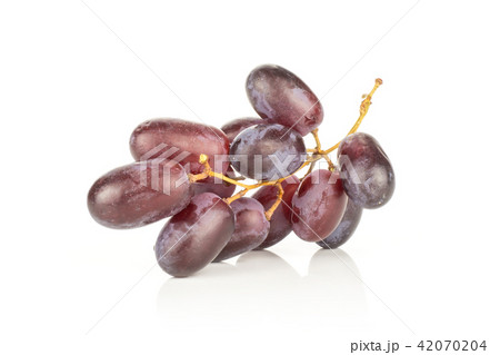 Raw fresh red globe grape isolated on white Raw fresh red globe grape isolated on white 42070204
