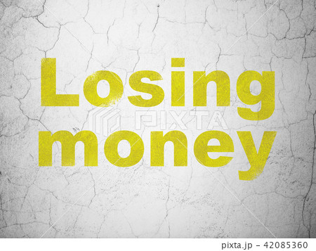 Banking concept: Losing Money on wall background 42085360