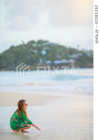 Happy girl enjoy summer vacation on the beach Happy girl enjoy summer vacation on the beach 42085392