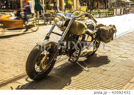 old and powerful vintage motorcycle with backpacks old and powerful vintage motorcycle with backpacks 42092432