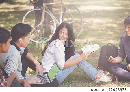 Group of university students working together 42098973