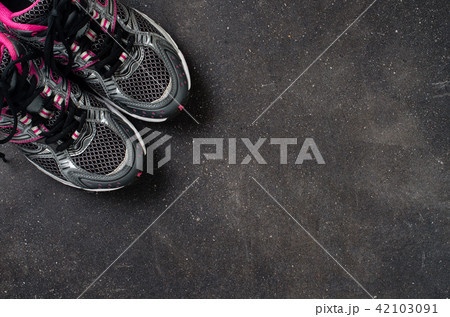 Fitness equipment on dark background Fitness equipment on dark background 42103091