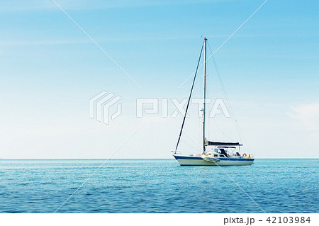 Yacht in the sea against blue sky 42103984
