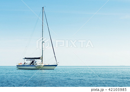 Yacht in the sea against blue sky Yacht in the sea against blue sky 42103985