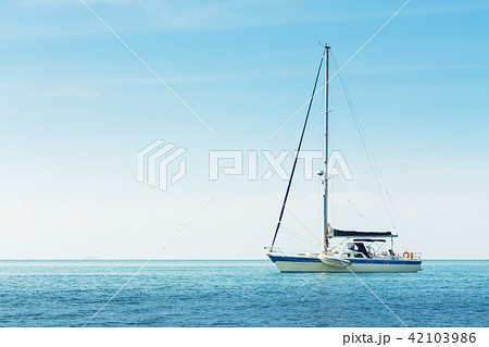 Yacht in the sea against blue sky 42103986
