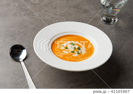 pumpkin soup with spices on table 42105907