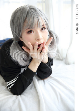 Asian young woman portrait in bed room  42109580