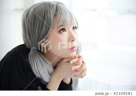 Asian young woman portrait in bed room Asian young woman portrait in bed room 42109581