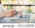 Asian women holding  credit card to payment  42113838