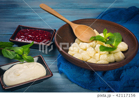 Lazy dumplings on blue background Lazy dumplings on blue background 42117156