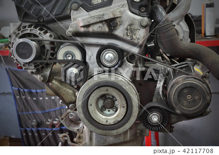 Modern car servicing pulley, belt and generator 42117708