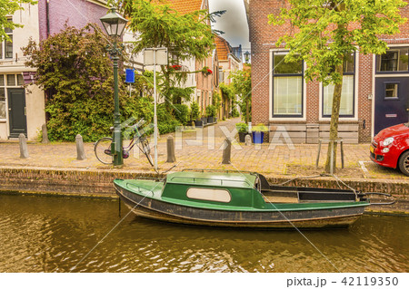 boat in an alkmaar channel. netherlands holland boat in an alkmaar channel. netherlands holland 42119350