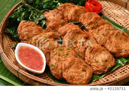 The fried fish-paste balls on white dish. 42120731