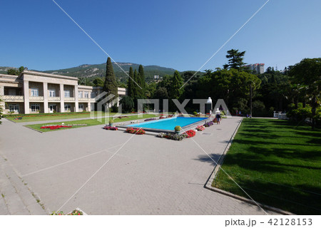 a pool with azure water in a spacious square in a  42128153