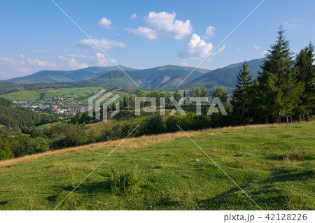 Magnificent landscape of mountain slopes and peaks Magnificent landscape of mountain slopes and peaks 42128226