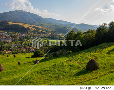 downhill from the mountain to the city overgrown w 42129422