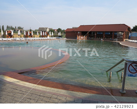 Deserted pool with clear clear water and standing Deserted pool with clear clear water and standing 42129923