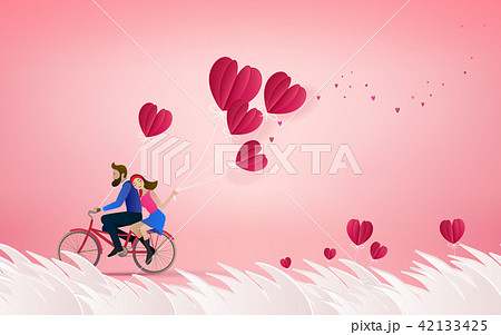 Happy couple is riding a bicycle together 42133425