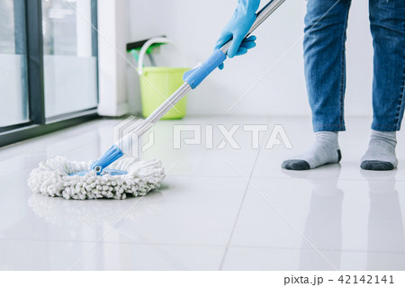 Housekeeping and cleaning concept, Happy young woman in blue rub 42142141