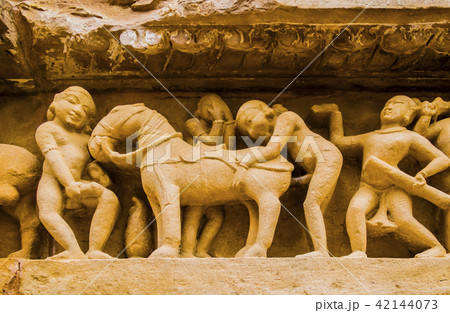 Erotic scenes in Kahjuraho temple, India Erotic scenes in Kahjuraho temple, India 42144073