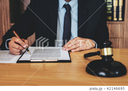 Judge gavel with Justice lawyers, Businessman in suit or lawyer Judge gavel with Justice lawyers, Businessman in suit or lawyer 42146695