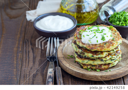 Vegetarian zucchini fritters or pancakes Vegetarian zucchini fritters or pancakes 42149258