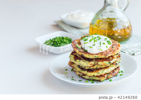 Vegetarian zucchini fritters or pancakes 42149260