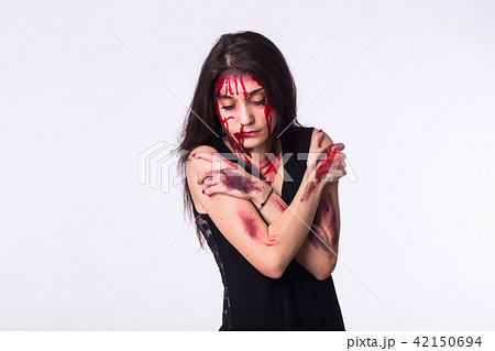 Women violence and abused concept on white background with copyspace. Trafficking Concept. Women violence and abused concept on white background with copyspace. Trafficking Concept. 42150694