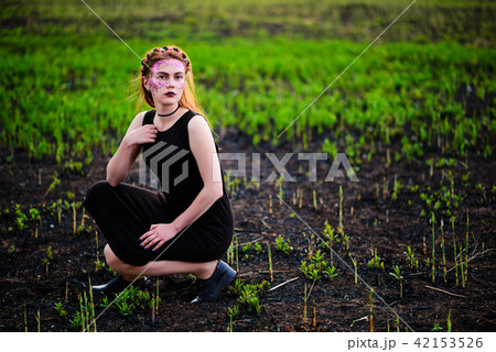 A young beautiful woman with a violet shine A young beautiful woman with a violet shine 42153526