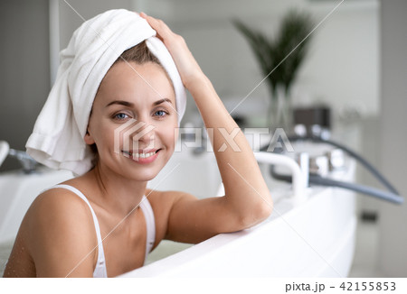 Positive woman during treatment in spa center Positive woman during treatment in spa center 42155853