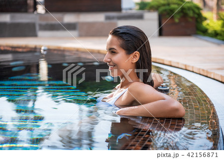 Satisfied girl resting in cool clear water Satisfied girl resting in cool clear water 42156871