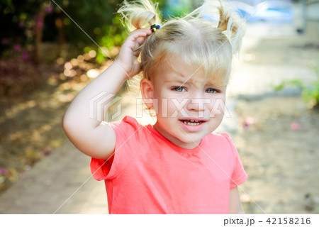 portrait of crying little toddler girl outdoors portrait of crying little toddler girl outdoors 42158216