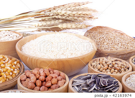 Cereal grains , seeds, beans on wooden background 42163974
