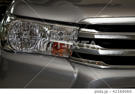 Closeup headlights of car. Closeup headlights of car. 42168060