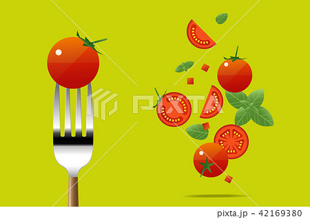 Fresh tomato on fork with flying tomatoes 42169380